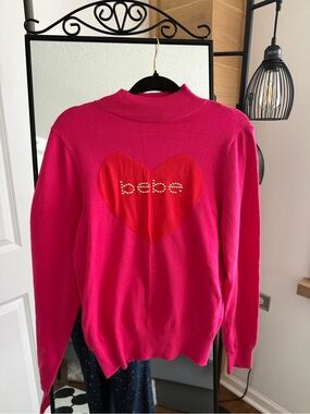 bebe Women's Hot Pink Heart Logo Sweater